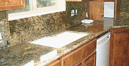 Granite backsplash in the form of large sheets for a seamless look