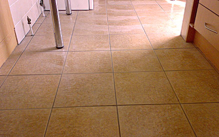 Beige ceramic flooring in a kitchen