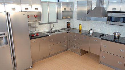 Metal kitchen cabinets and appliances made of stainless steel