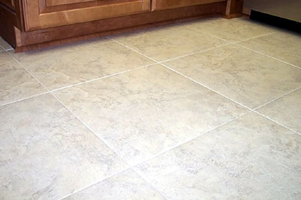 Light porcelain flooring in the form of large square tiles