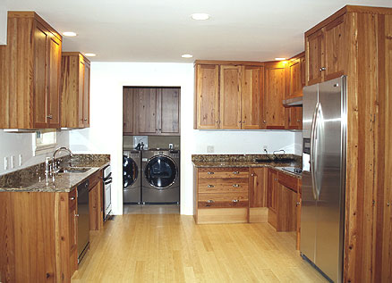 Nice big kitchen with reclaimed pine cabinets and Energy Star stainless steel appliances