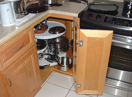 Corner kitchen base cabinet with standard round Lazy Susan shelves