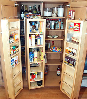 Kitchen pantry cabinet with shelves and door racks