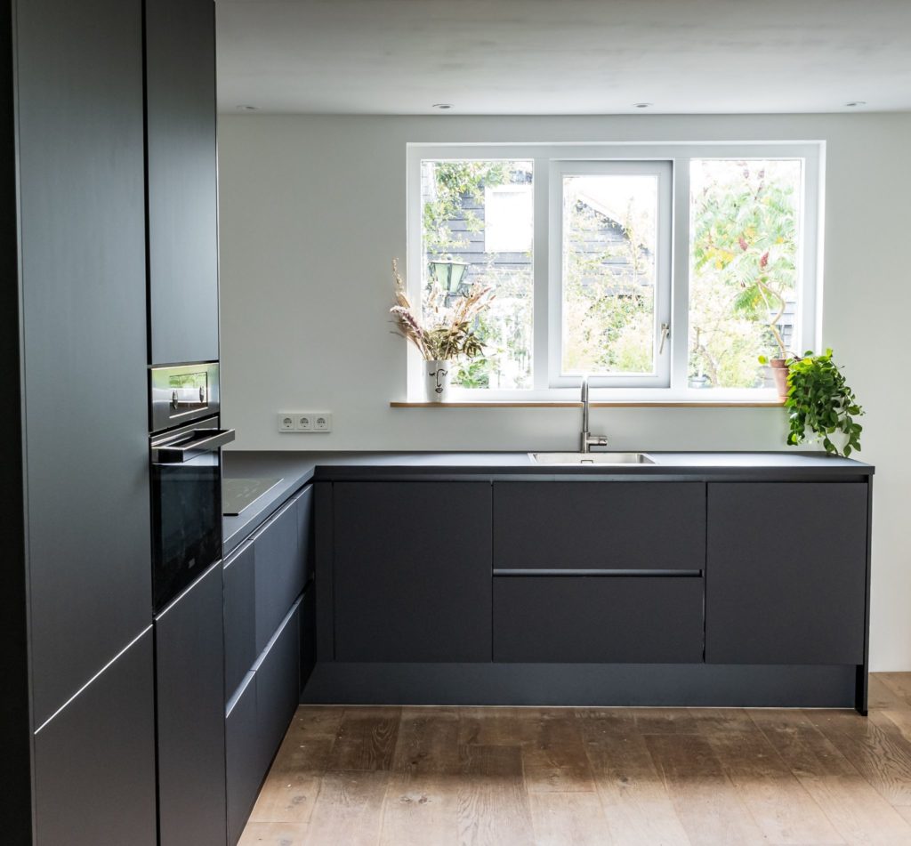 Dark gray kitchen cabinets