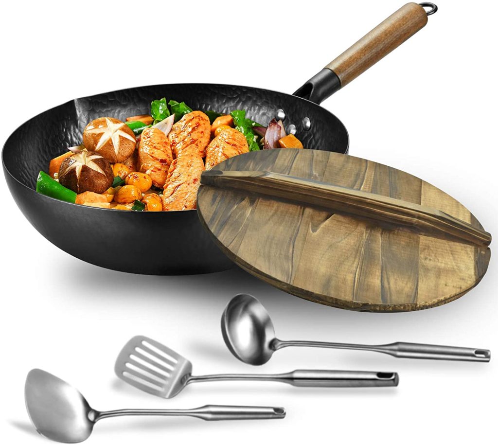 Carbon steel wok pan. A flat bottom pan with lid for electric, induction and gas stoves.